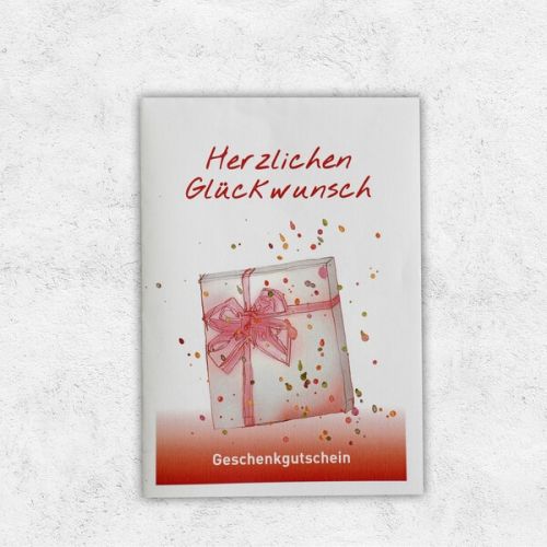 Eine Gutscheinkarte, bedruckt mit einem Geschenk und der Aufschrift Herzlichen Glückwunsch.