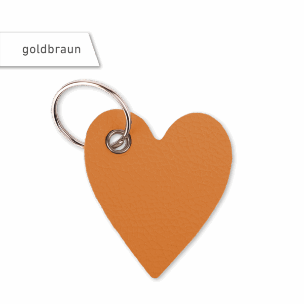 Schlüsselanhänger aus Leder in Herzform in der Farbe goldbraun.